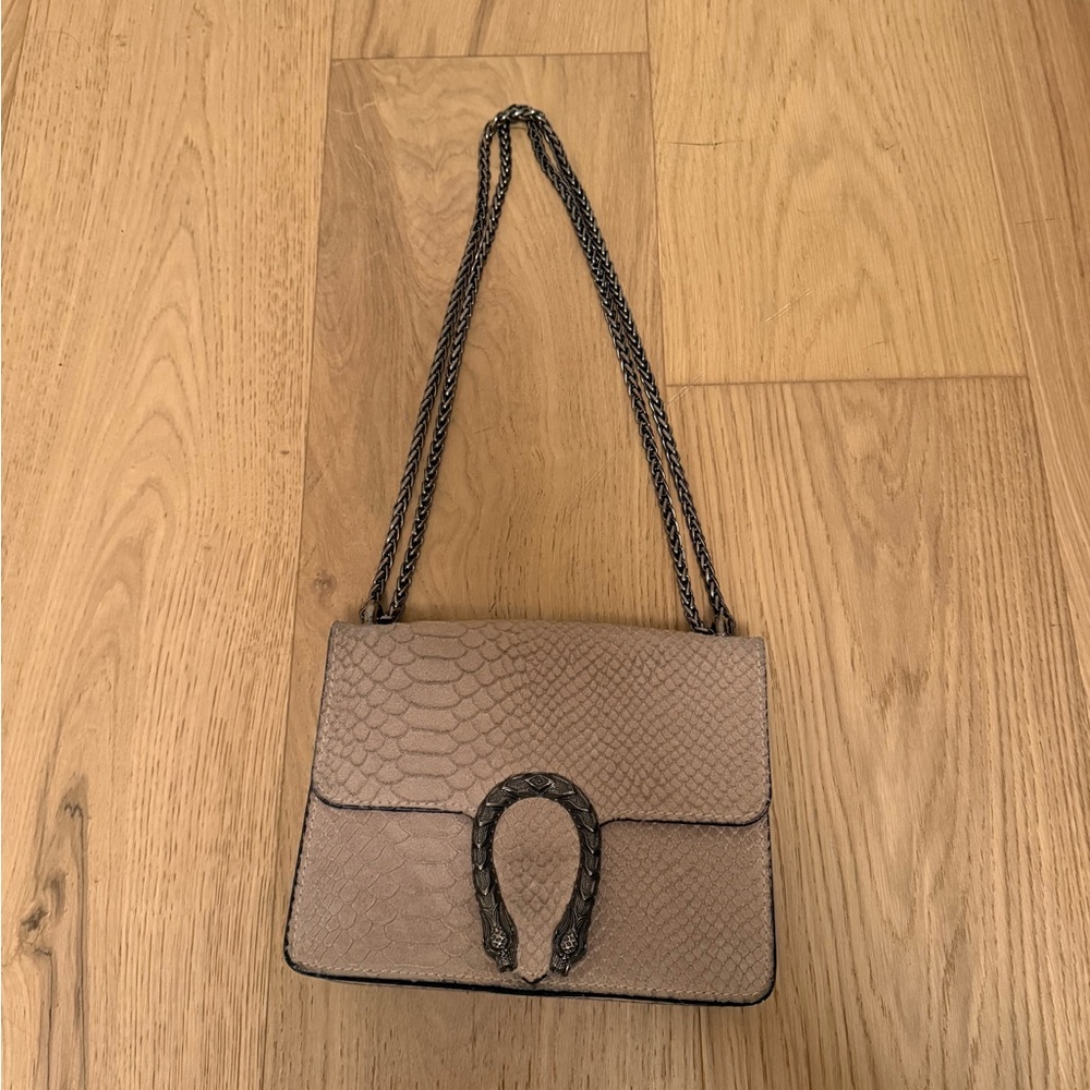 Horse shoe cross body bag